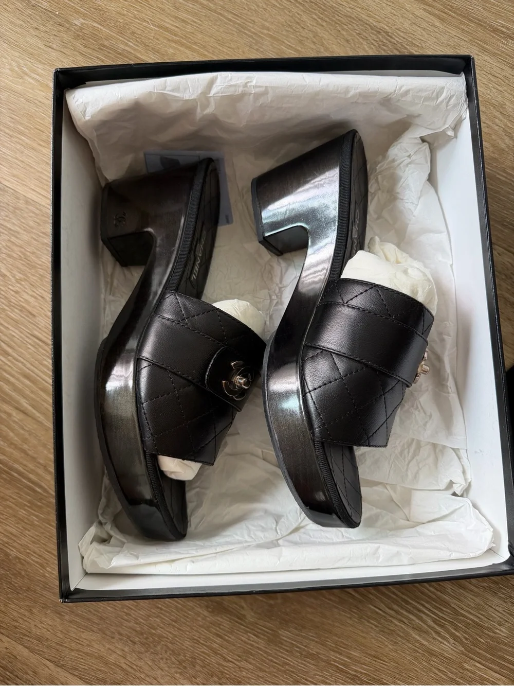 CHANEL Black Quilted Leather Slide Mules